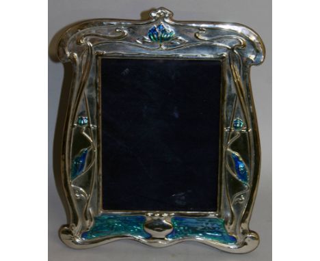 A LARGE PLATED ART NOUVEAU STYLE SILVER AND ENAMEL PHOTOGRAPH FRAME. 11.5ins x 9.5ins.