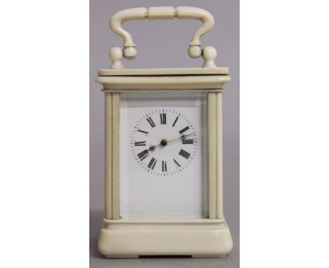 A SUPERB RARE 19TH CENTURY FRENCH IVORY CARRIAGE TYPE CLOCK with three carved panels. 3ins high.Please note: John Nicholson d