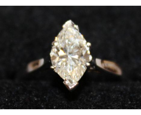 A SUPERB SINGLE STONE DIAMOND MARQUISE RING of 1.2cts, set in 18ct white gold.