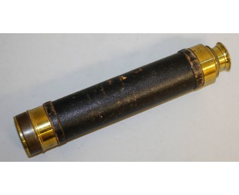 A 19TH CENTURY BRASS AND LEATHER FOLDING TELESCOPE.