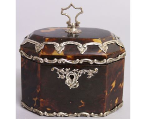 A SUPERB GEORGE III SILVER MOUNTED TORTOISESHELL OCTAGONAL TEA CADDY.  4.5ins.