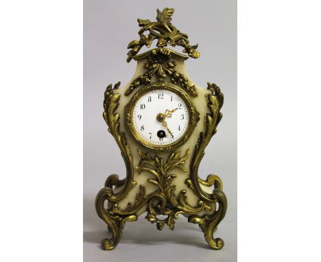 A GOOD QUALITY SMALL 19TH CENTURY FRENCH SHAPED WHITE MARBLE AND ORMOLU CLOCK, with white dial and rich ormolu mounts. 10ins 