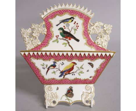 A 19TH CENTURY COALPORT LETTER RACK, painted with birds on a pink scale ground, probably by John Randall, See Messanger, Coal