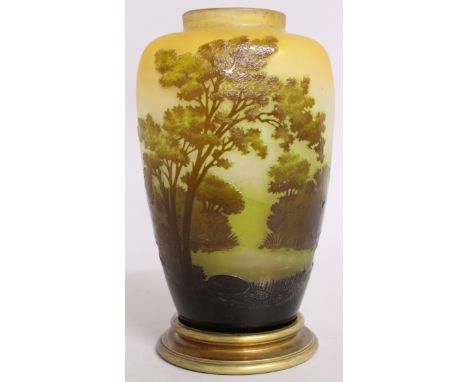 EMILE GALLE A SUPERB CAMEO GLASS VASE, with a Lakeland scene with trees. Signed Galle, on a metal base.  9ins high.