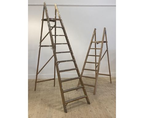 A graduated pair of vintage beech decorators step ladders larger H217cm