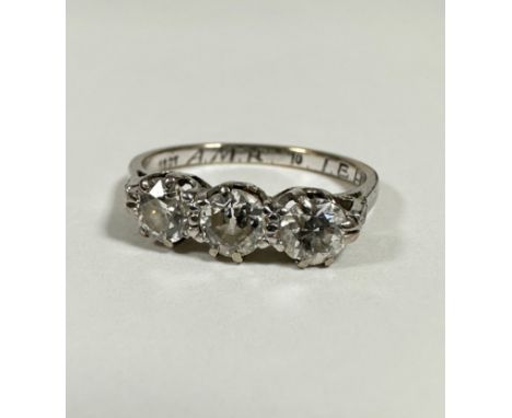 An 18ct white gold three stone old cut diamond ring mounted in claw setting (each stone: 0.2ct) (N) (2.66g)