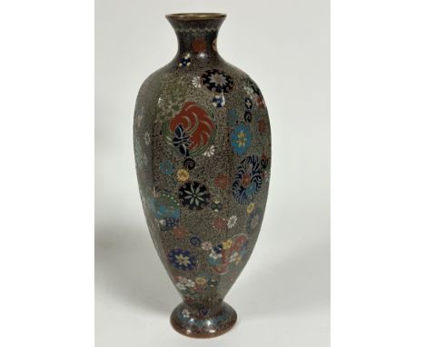 A Japanese Meji period Kyotojippo style cloisonne octagonal baluster vase, decorated with circular scrolling flower and leave