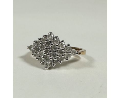 A 9ct gold triangular diamond cluster ring, each stone approx. 0.01ct, mounted in white gold (P/Q), 4.1g