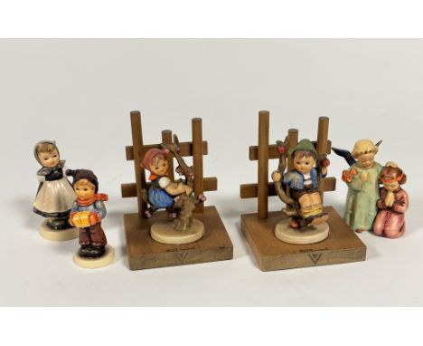 A pair of Hummel treen fence bookends with Apple Tree Boy and Apple Tree Girl (13cm), three various other figures including A
