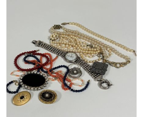 Two paste pearl necklaces (one a/f), a paste pearl bracelet, a white metal lady's quartz wristwatch, a coral bead necklace, a