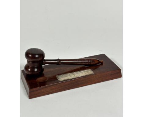 A mahogany silver presentation gavel and stand, with engraved plaque, Presented to the North British Hereford Breeders Associ