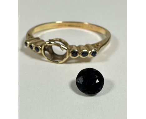 A yellow metal sapphire seven stone ring, the centre circular cut sapphire, loose, flanked by three sapphire points, all moun