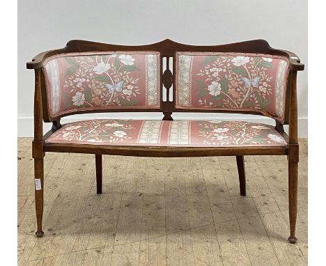 An Edwardian upholstered beech framed drawing room sofa, raised on turned supports. H83cm, W113cm, D52cm