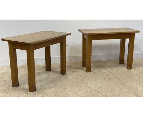 A pair of oak console tables, each raised on square chamfered supports, H79cm, W110cm, D60cm.