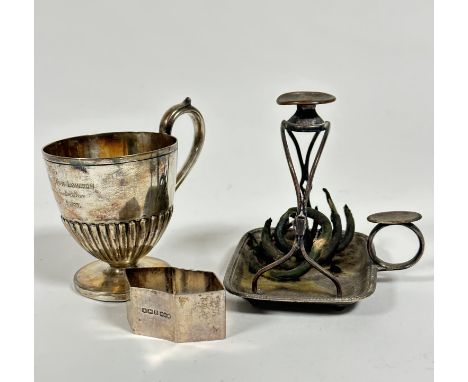 A 19thc Sheffield plated chamber candlestick holder with twin wire end supports on gadroon moulded base (11cm), an Epns engra