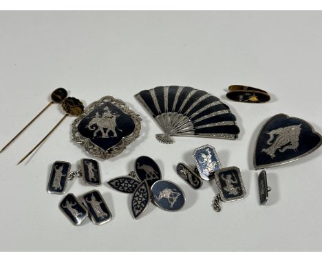 A collection of Thai sterling silver including fan shaped black enamelled brooch (4.5cm x 7cm), an oval brooch with figure ri