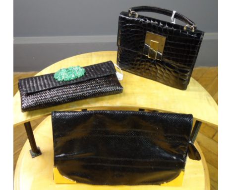 A 1960s black crocodile handbag, a 1970s Eduardo Giannotti snakeskin and suede clutch bag and a black with jade clutch bag