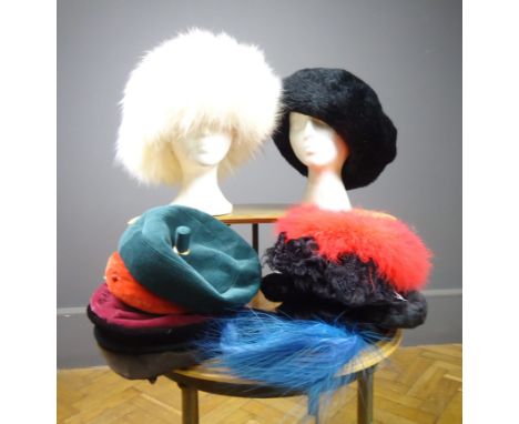 An assortment of ladies vintage fur, feathered and velvet hats