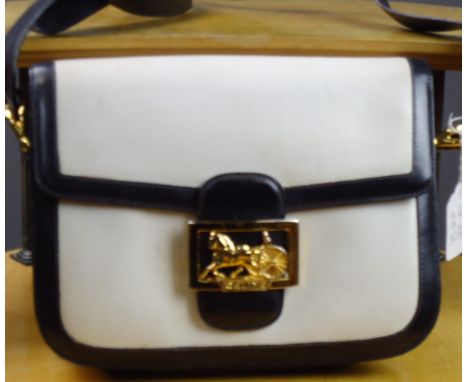 A Celine 1980s shoulder bag, cream and black with gold colour buckle, with original dust bag