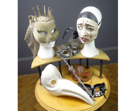 A collection of Venetian masks, to include El Dotori, a vintage cat mask and others