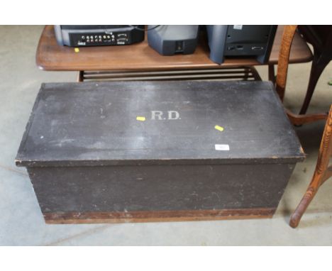 A wooden tool box and contents of various hand tools, leather cased tape measures etc.