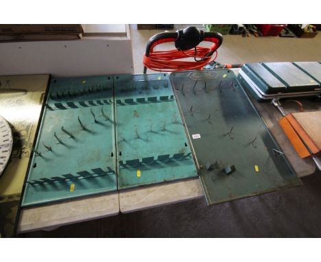 A pair of Matador metal tool racks together with a CK tool rack