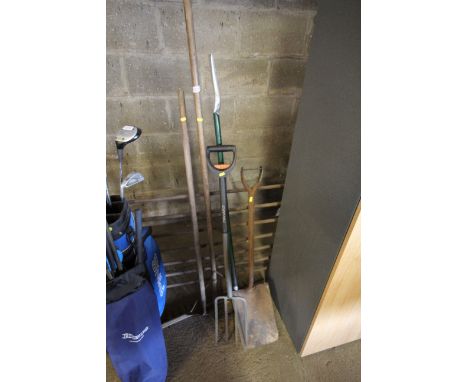 A quantity of gardening tools to include forks, spade, rake etc. 