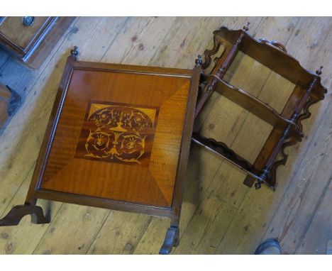 A mahogany fire screen, with inlaid decoration, 20ins x 26.5ins, together with a set of walnut wall shelves, 24ins x 21ins
