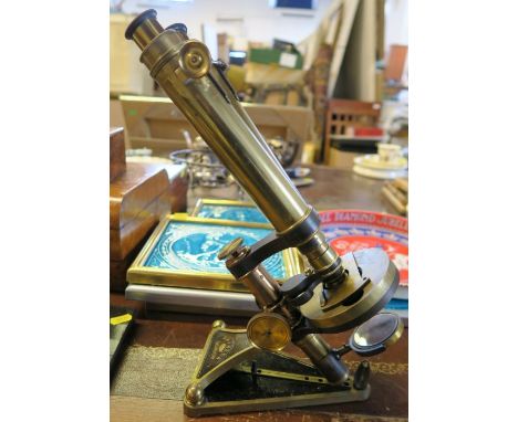 A 19th century lacquered brass R &amp; J Beck London binocular microscope, no.&nbsp; 5791 on folding base, in a fitted mahoga