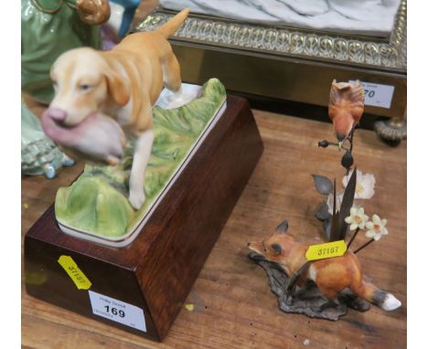 A Royal Worcester model, Yellow Labrador by Doris Lindner, together with two Royal Worcester porcelain and bronze models