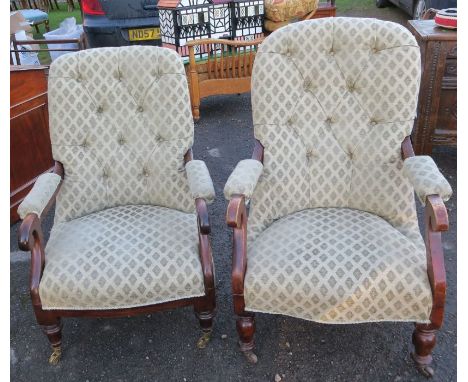 Two Edwardian mahogany and upholstered armchairs, with button back