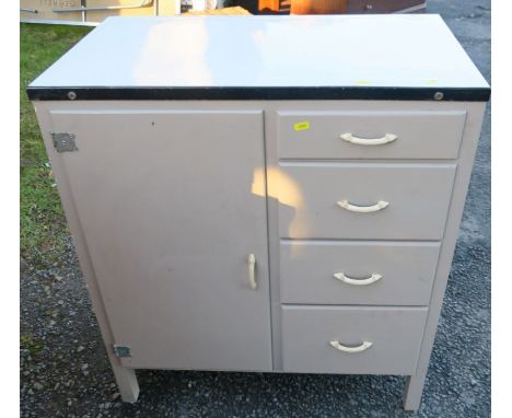 An enamel top kitchen cupboard, having cupboard door and four drawers, width 30.5ins x depth 18ins x height 33ins