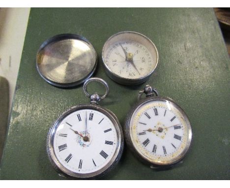 Two silver cased ladies pocket watches and a compass