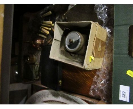 A box of assorted items to include a bike lamp, a kukri knife, flatware etc