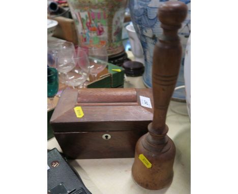 A 19th century tea caddy, together with a turned wooden priest