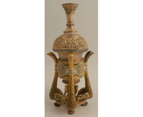 A 19th century Royal Worcester Persian style centre piece, the pierced baluster vase supported on a base formed as four birds