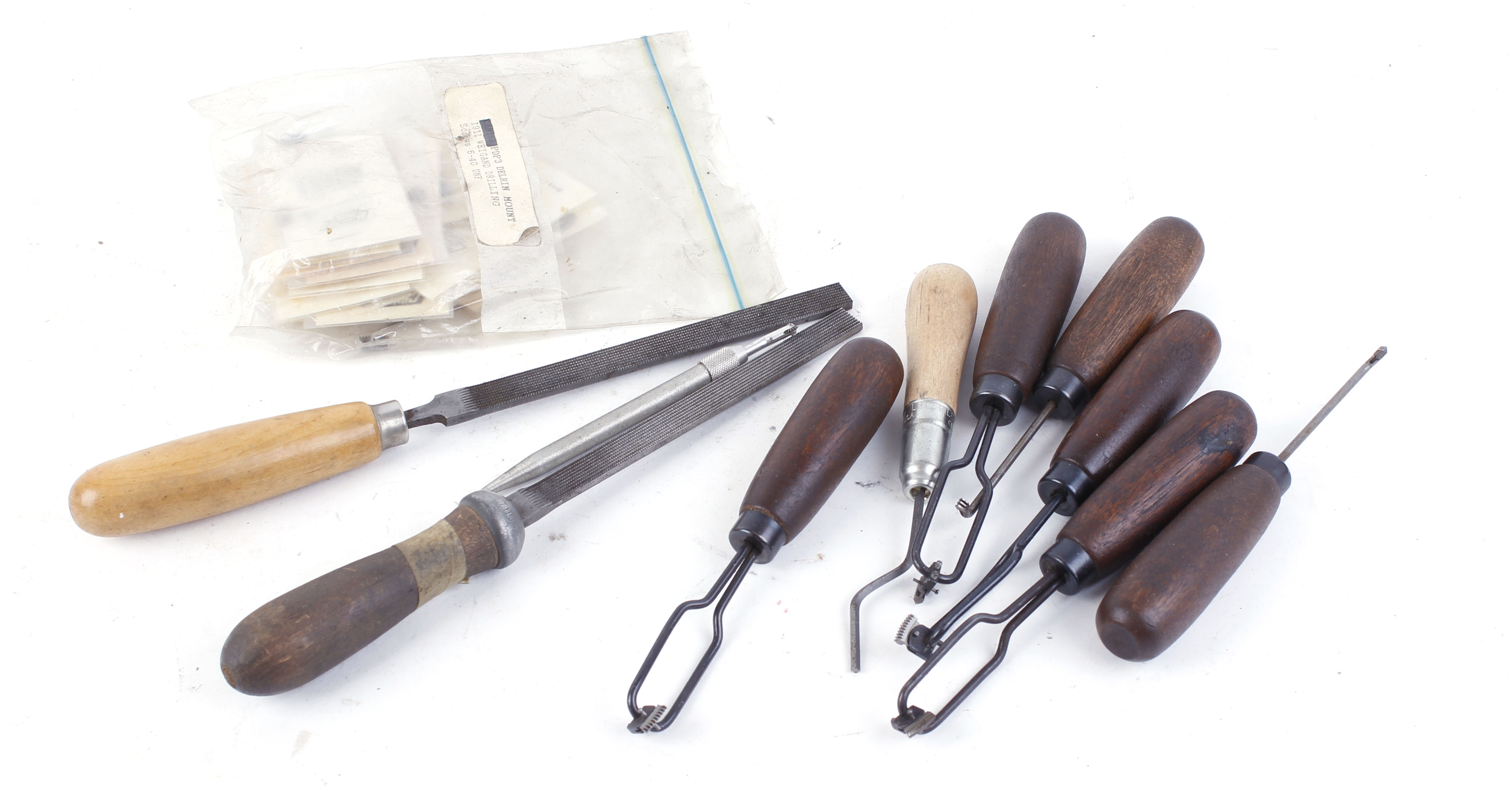 Six Brownells full view checkering tools with quantity of cutters