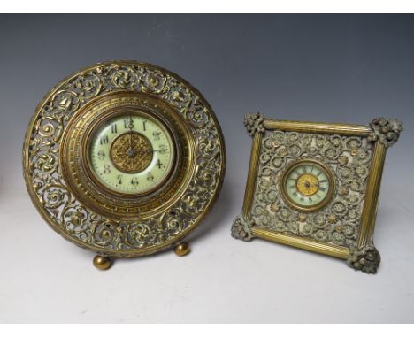 A LATE 19TH /EARLY 20TH CENTURY FRENCH BRASS EASEL BACK MANTEL CLOCK WITH  PIERCED DECORATION, the circular dial set with Ara