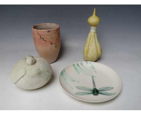 A COLLECTION OF FOUR ITEMS OF 20TH CENTURY STUDIO POTTERY, to include a dragonfly embellished plate, a 'blow up' figure of a 