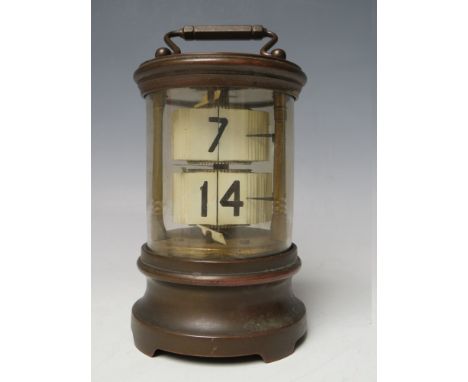 A LATE 19TH / EARLY 20TH CENTURY TICKET CLOCK, the brass case of cylindrical form with two sets of 'tickets', overall H 16 cm