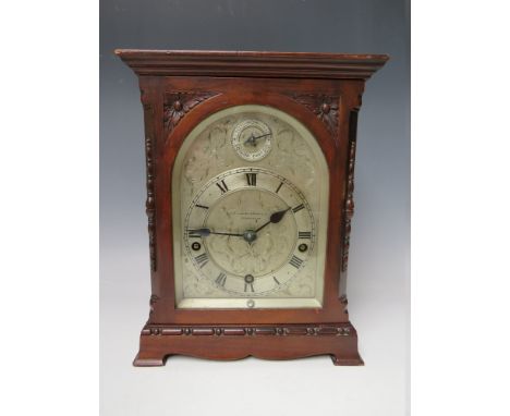 A MAHOGANY CASED J.J. ELLIOTT WESTMINSTER CHIME MANTLE CLOCK, retailed by E.H. Lawley &amp; Sons Ltd., Birmingham, the silver