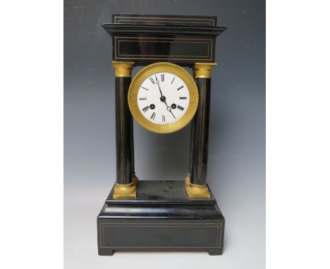 A FRENCH EBONISED PORTICO CLOCK, the architectural case with four pillars having decorative gilt mounts to top and bottom, th