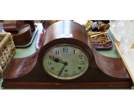 A mahogany chiming mantel clock