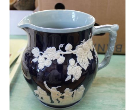 A 19th Century Wedgwood two tone blue jug with harvest scene decoration (light body cracks)