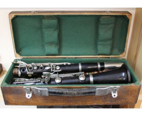 A cased English clarinet