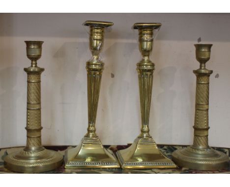 A pair of Adam style brass candlesticks with fluted and beaded decoration and detachable sconces, 9 3/4" high plus a pair of 