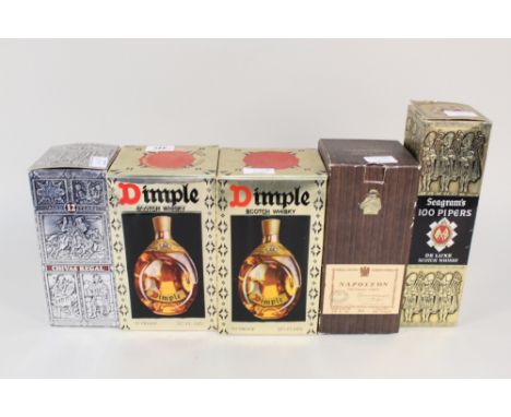 A bottle of Chivas Regal whisky, a bottle of Seagrams 100 Pipers whisky, a bottle of Napoleon cognac plus two bottles of Dimp