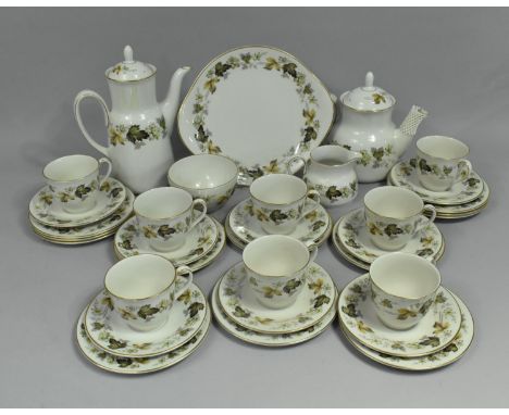 A Royal Doulton Larchmont Pattern Tea Set to comprise Teapot, Coffee Pot, Eight Cups, Eight Saucers, Twelve Side Plates, Milk