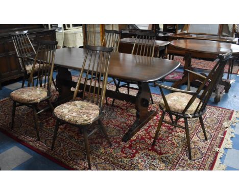 An Ercol Refectory Dining Table, 180x86cm Together with Six Dining Chairs to Include Two Carvers 