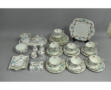 A Crown Staffordshire Rose and Blue Ribbon Swag Decorated Tea Set to comprise Nine Cups, Eight Saucers, Ten Side Plates, Five